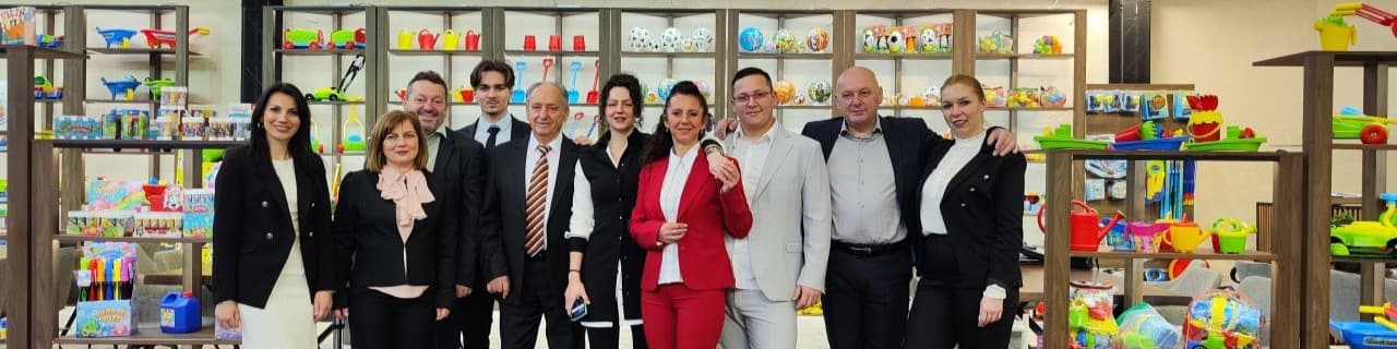 The Dema-Stil team standing together in the company showroom